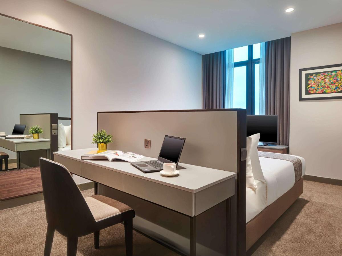 Mercure Living Putrajaya Dış mekan fotoğraf A bedroom at the hotel