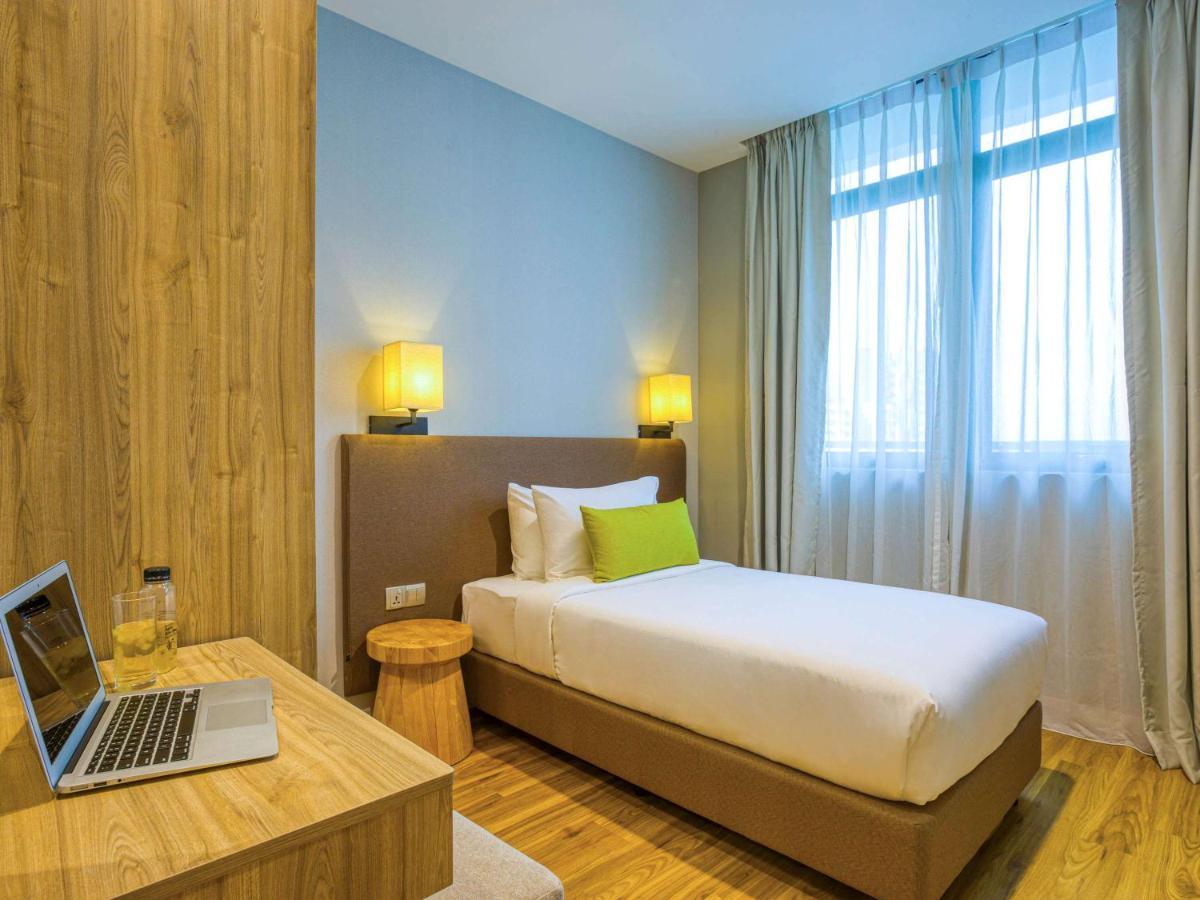 Mercure Living Putrajaya Dış mekan fotoğraf A single room at the hotel